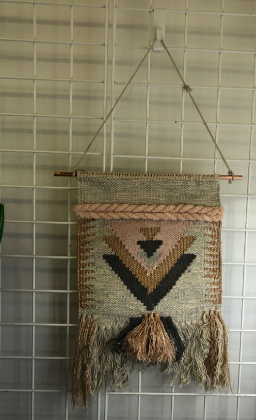 BRAIDED TASSEL WALL DECOR.