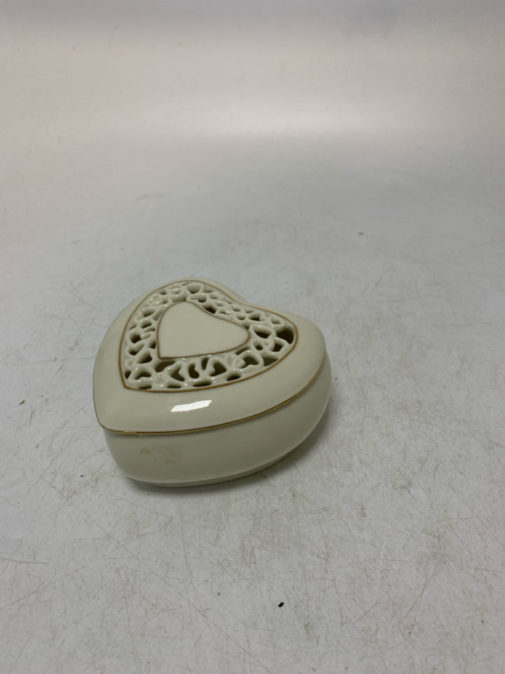 HEART SHAPED PIERCED PORCELAIN TRINKET BOX.
