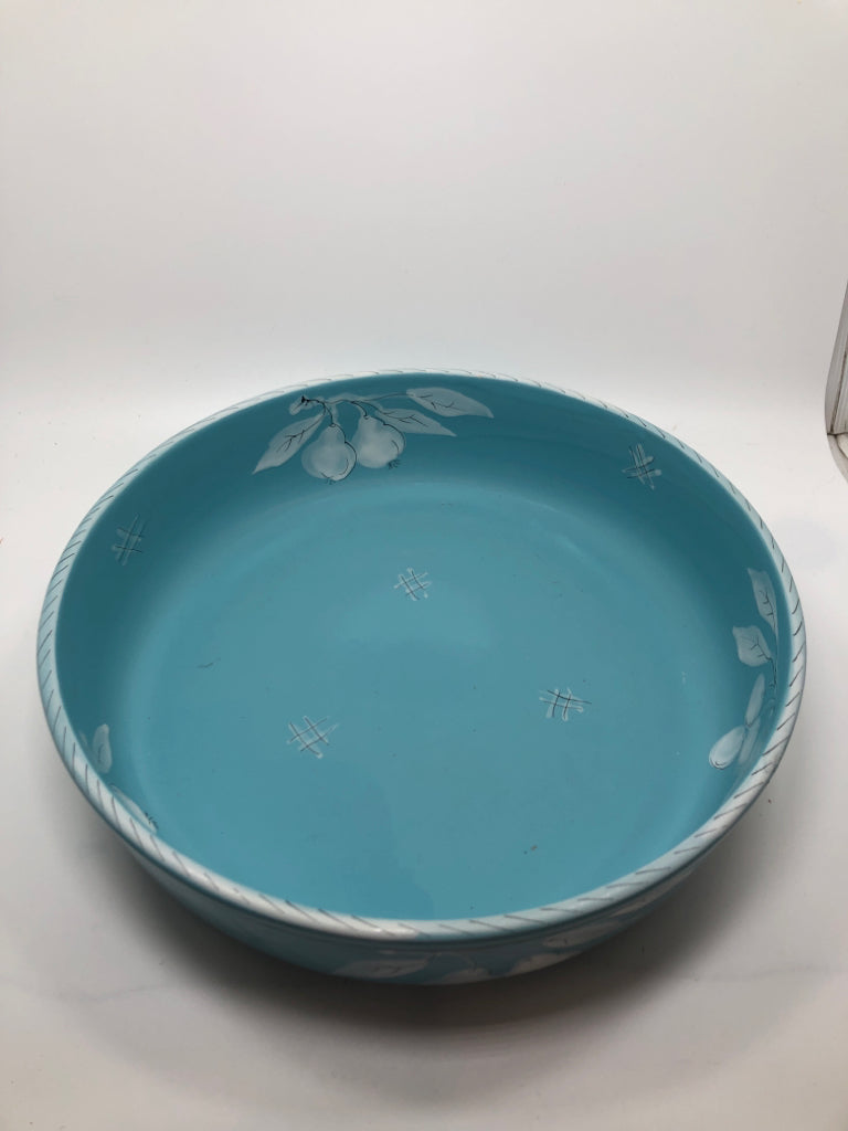 BLUE CERAMIC SERVING BOWL W/WHITE PAINTED FRUITS.
