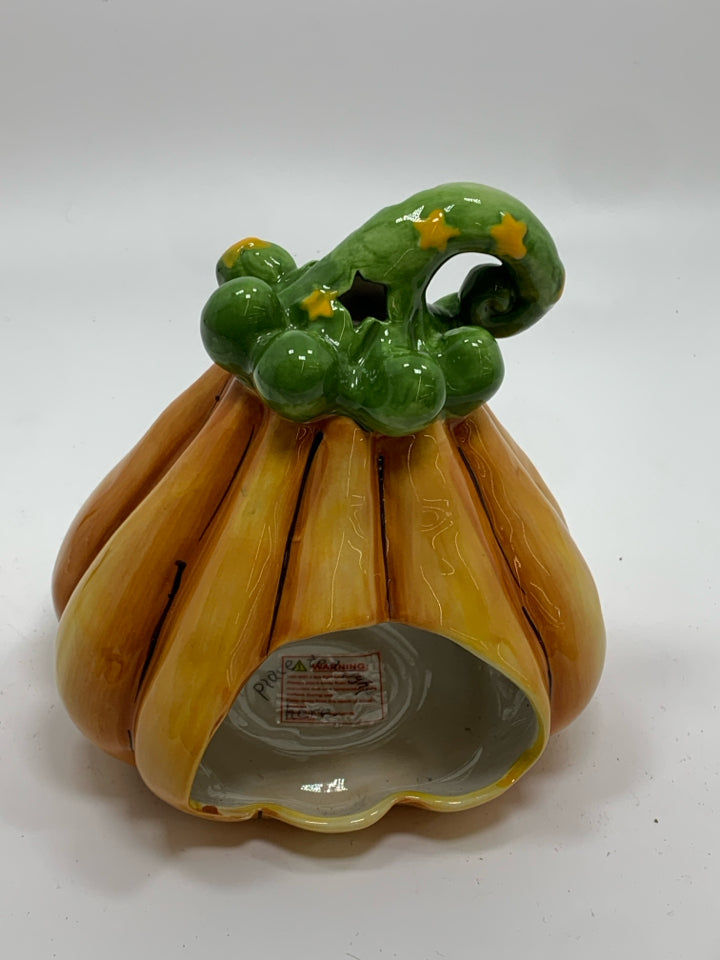 JACK O LANTERN CERAMIC TEALIGHT HOLDER.