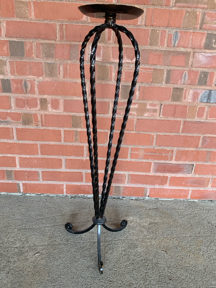 TALL METAL WROUGHT IRON CANDLE STAND.