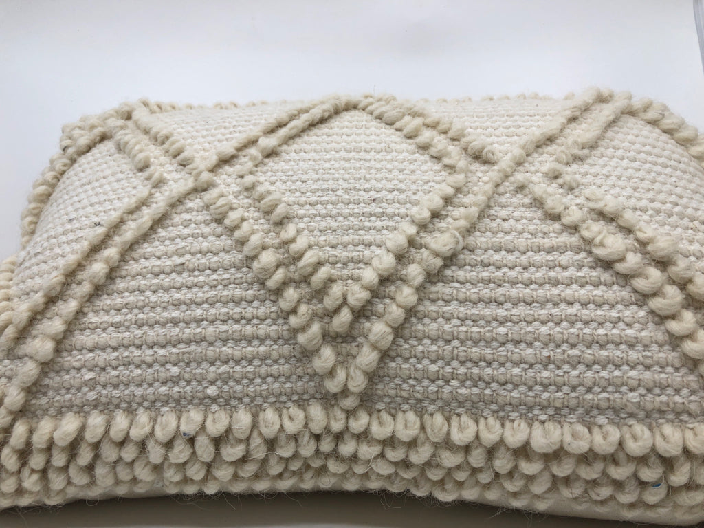 WHITE BEADED PATTERN RECTANGLE PILLOW.