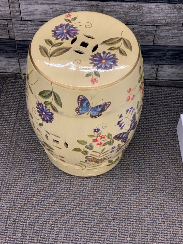 FLOWER PAINTED YELLOW CERAMIC GARDEN STOOL.