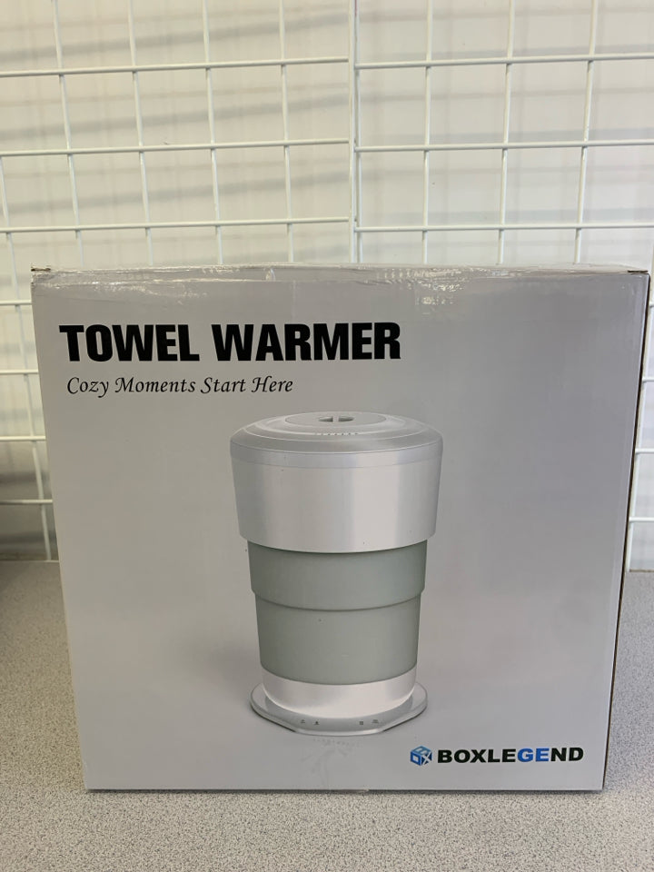NIB FOLDABLE TOWEL WARMER.