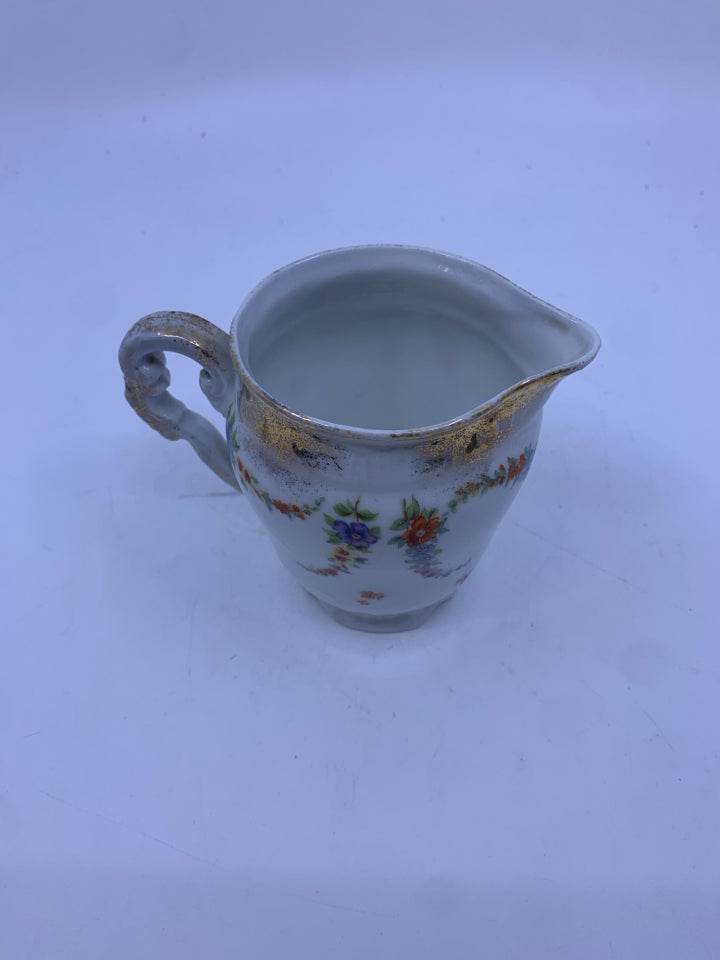 VTG THIN PORCELAIN FLORAL CREAMER.