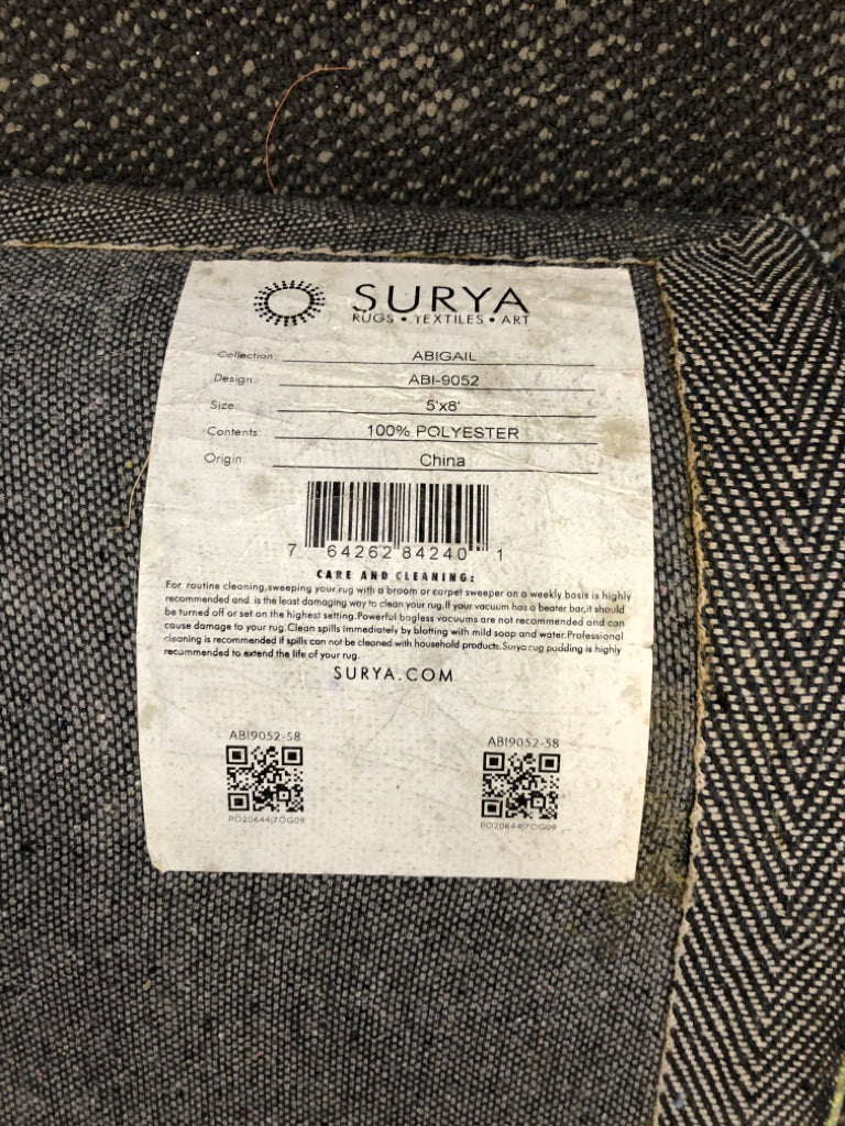 SURYA ABIGAIL BLUE AND GREEN RUG.