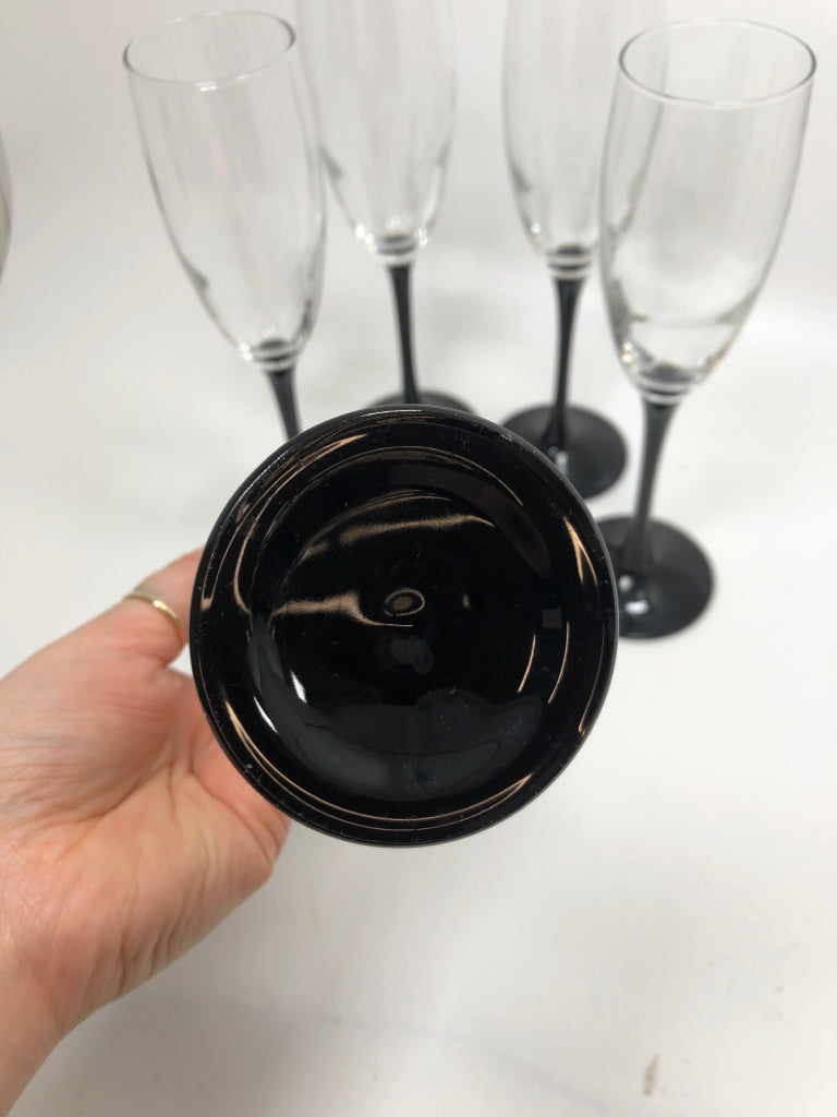 5 BLACK STEMMED FLUTES MADE IN FRANCE.
