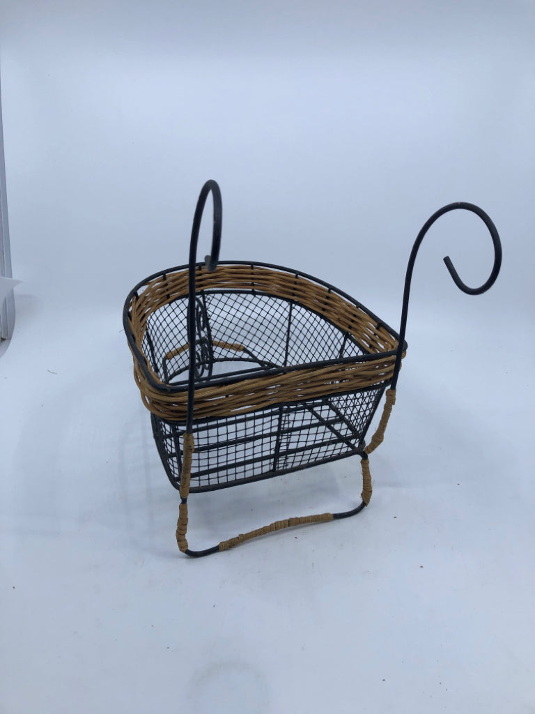 METAL WIRE WHEELBARROW BASKET PLANTER.