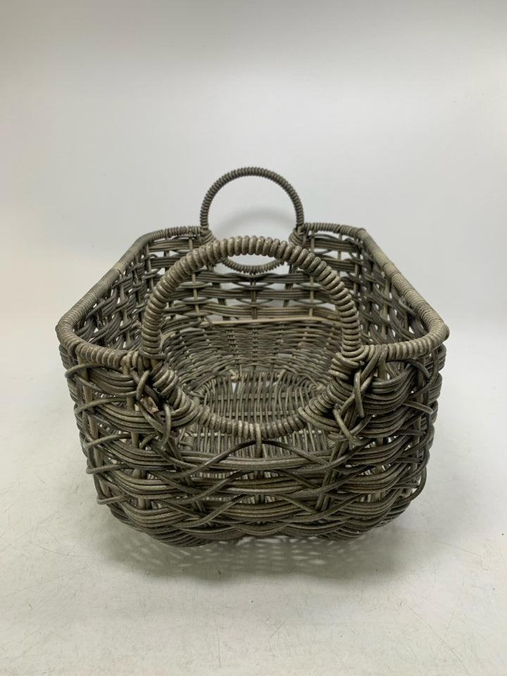 STURDY WOVEN ROUNDED BOTTOM GREY BASKET W/ CIRCLE HANDLES.