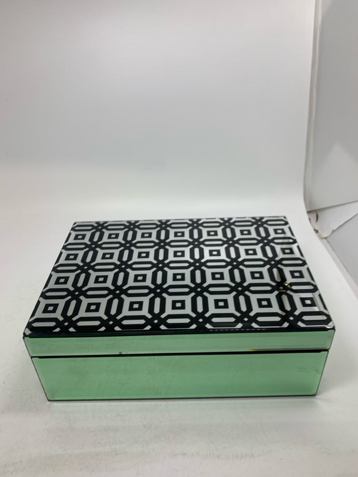 GLASS MIRRORED BOX W/ BLACK GEOMETRIC PATTERNED TOP.