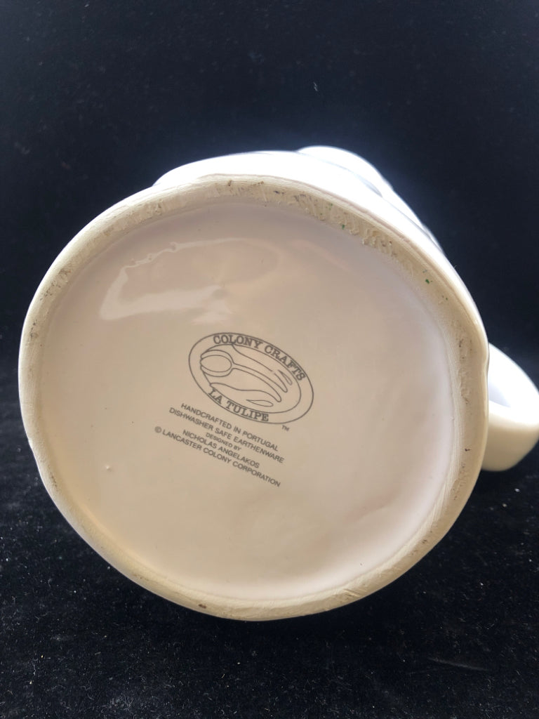 WHITE EMBOSSED TULIP PITCHER W ICE LIP.