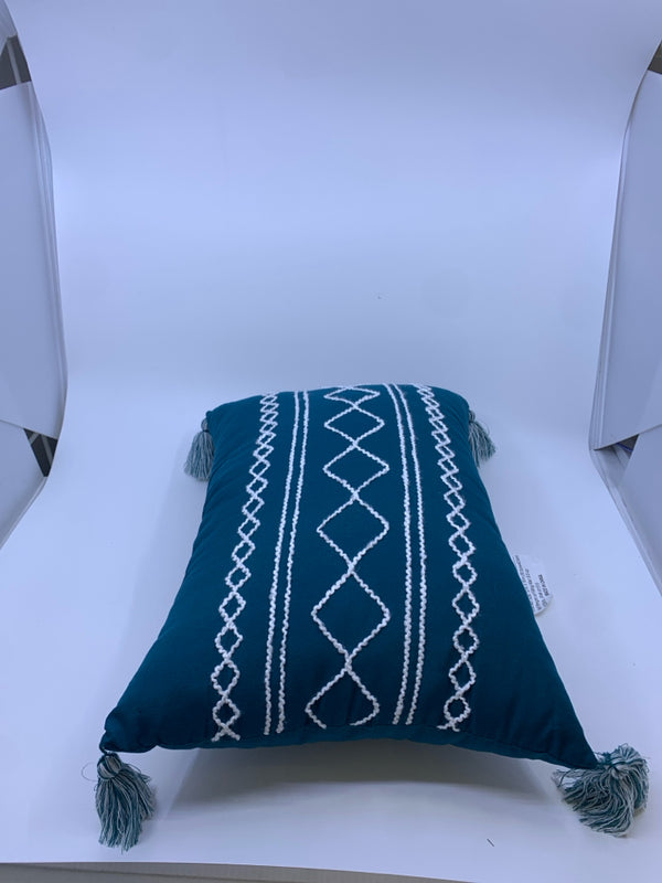 TEAL AND WHITE RECTANGLE TASSEL PILLOW.