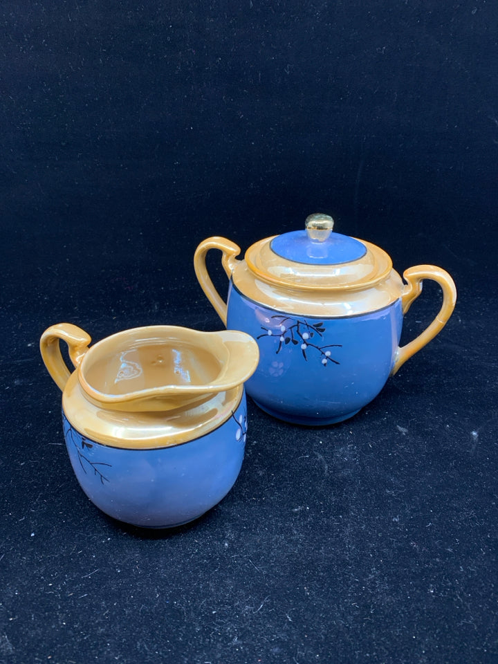 VTG BLUE AND ORANGE SUGAR AND CREAMER.