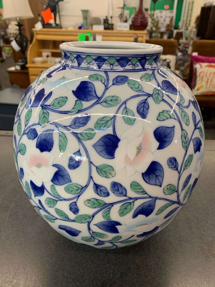 ROUND BLUE FLORAL CERAMIC VASE.