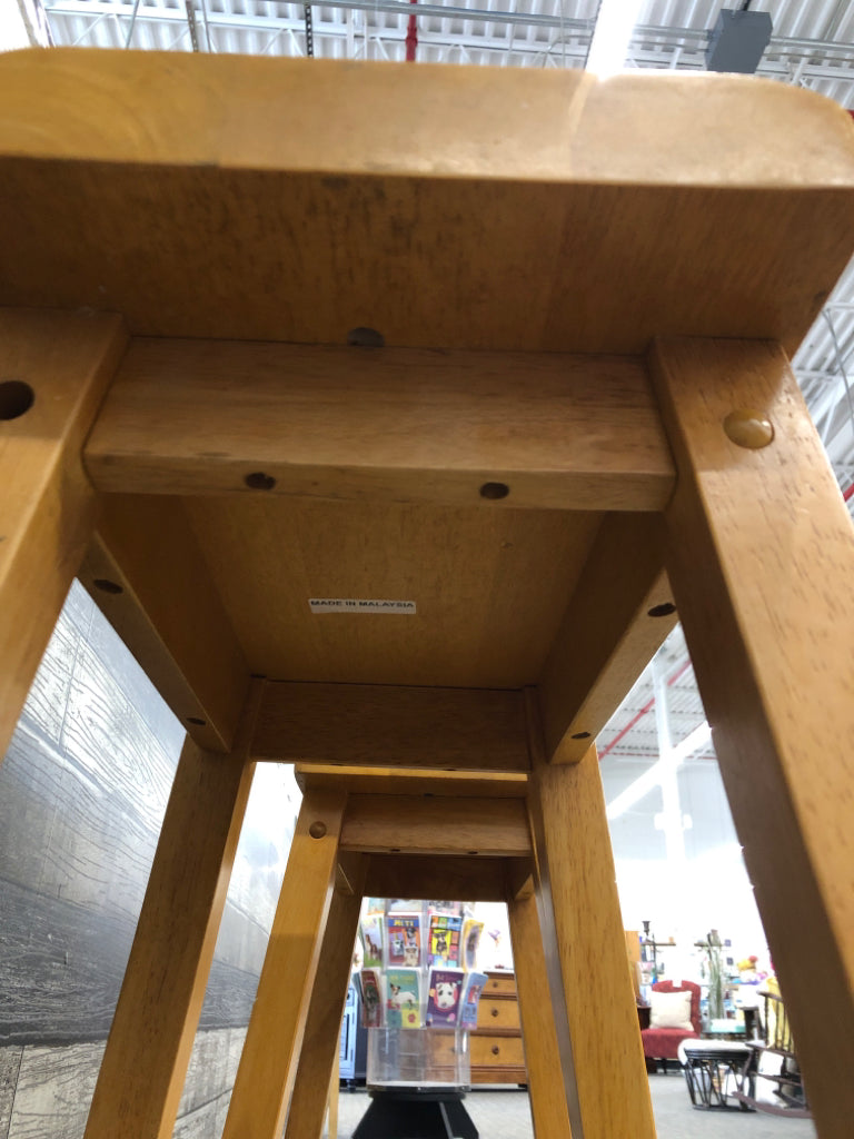 2 SHORT WOOD STOOLS.