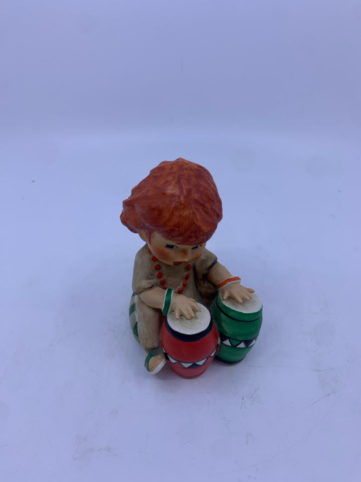 REDHEAD KID PLAYING THE BONGOS FIGURE.
