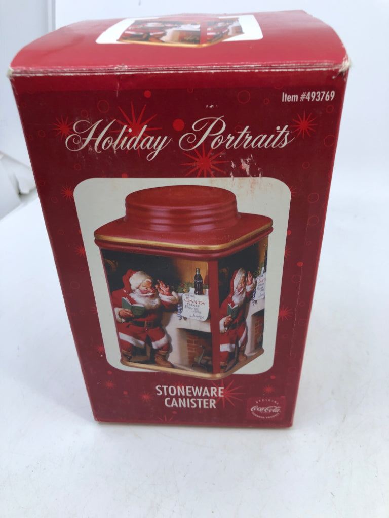 NIB GREEN SANTA STONEWARE CANISTER WITH LID.