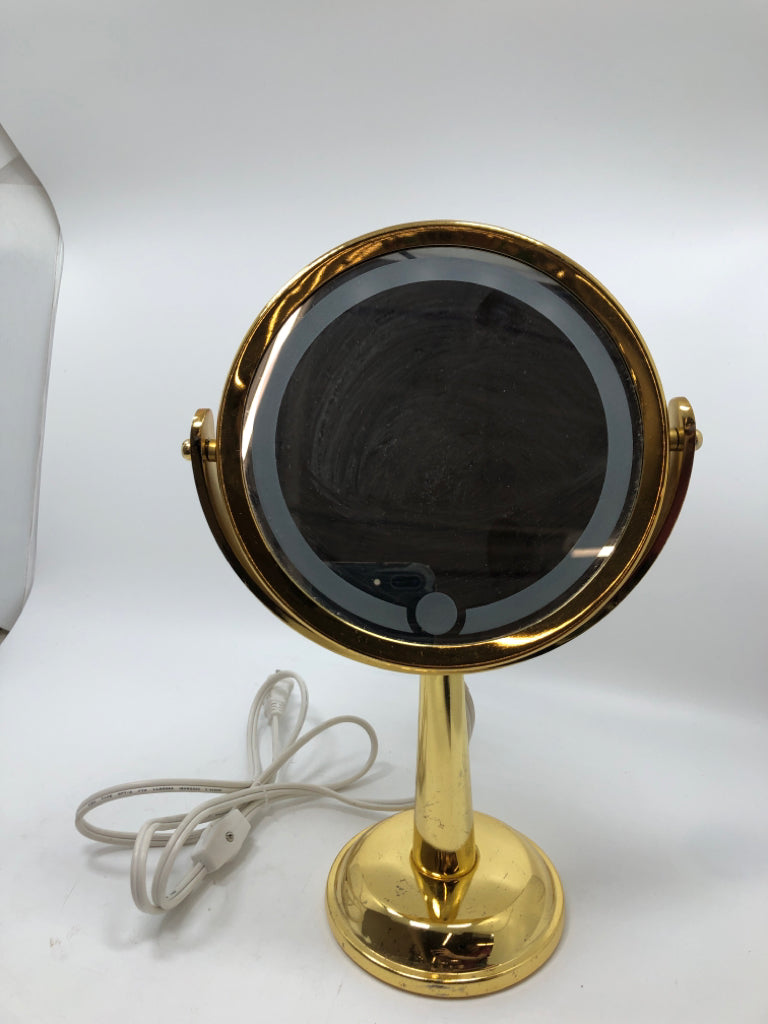 GOLD MAGNIFYING MAKEUP MIRROR.