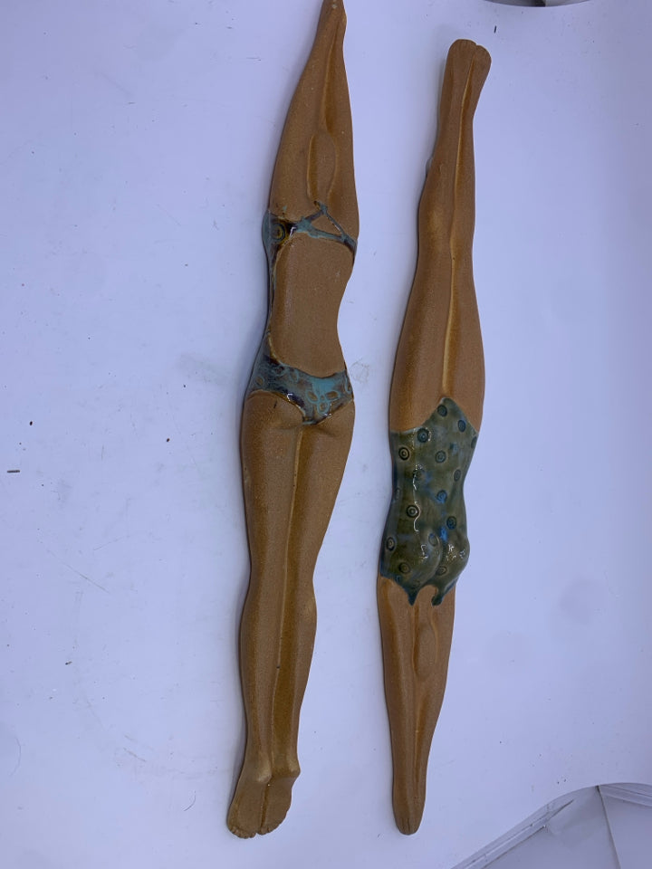 2 CERAMIC WOMAN SWIMMER IN BATHING SUITS WALL ART.