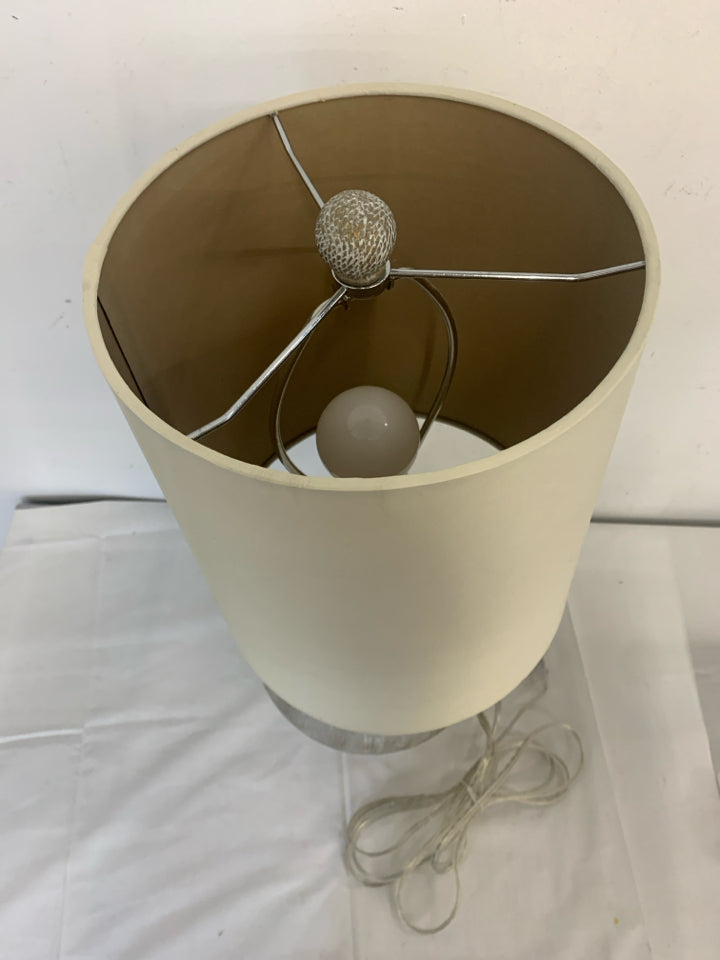 GREY PATTERN ROUND BASE LAMP W TAN SHADE.