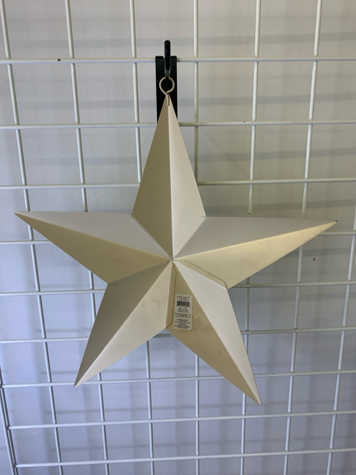 CREAM AND GREEN METAL STAR.