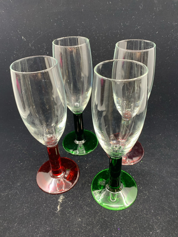 4 GLASSES W/ GREEN & RED STEMS.