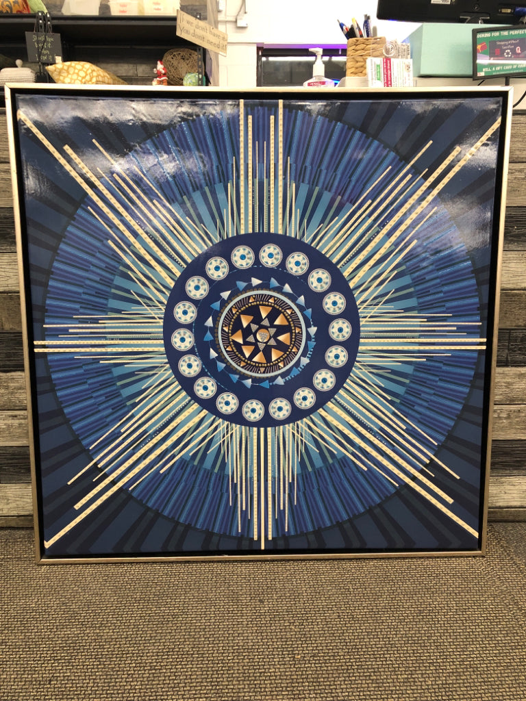 LARGE CANVAS IN GOLD FRAME BLUE/WHITE STARBURST TEXTURED.