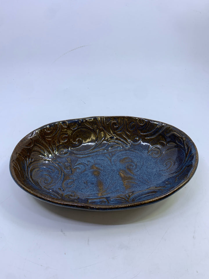 CERAMIC BLUE & BROWN BOWL W/RAISED DESIGN.