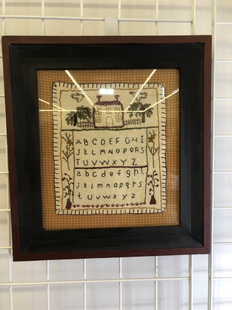 PRIMITIVE EMBROIDERED ALPHABET.