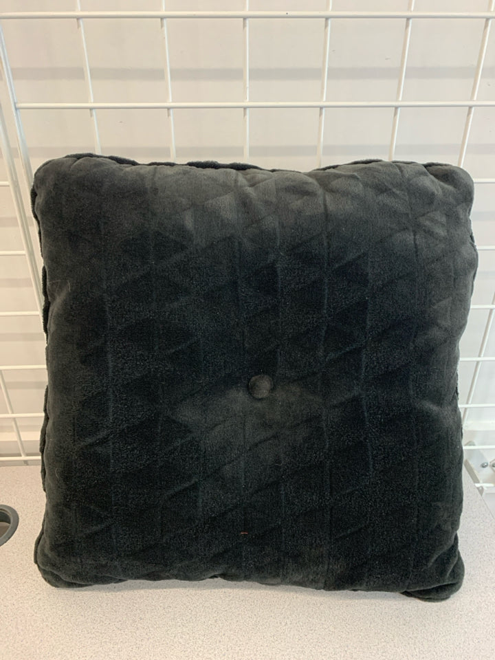 BLACK FUZZY PILLOW.