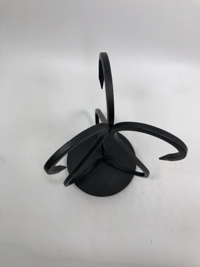 BLACK SCROLL METAL PILLAR CANDLE HOLDER.