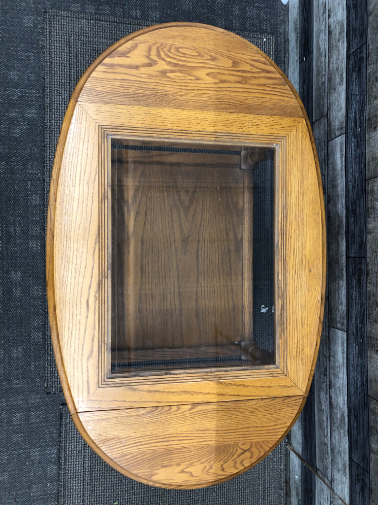 OAK WOOD COFFEE TABLE W/ GLASS TOP/FOLDING SIDES.