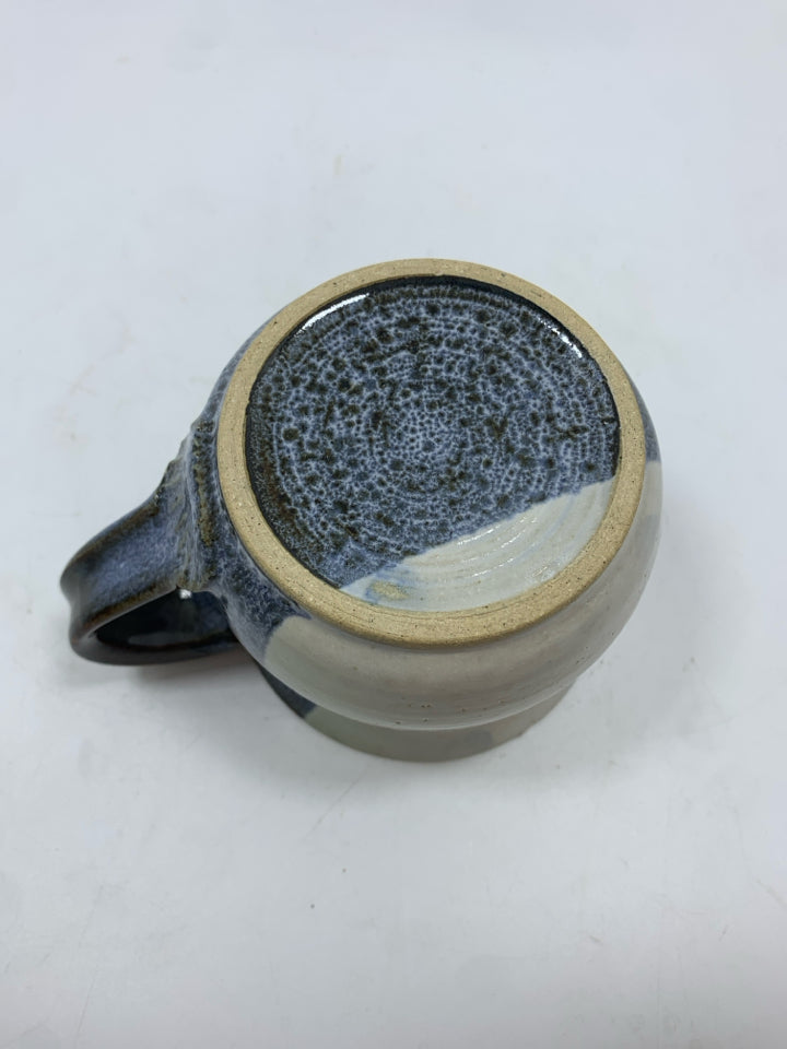 BLUE/WHITE GLAZED POTTERY MUG.
