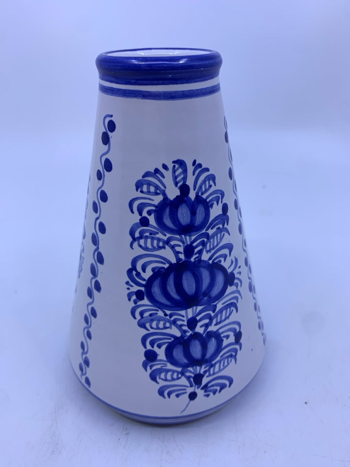 WHITE/BLUE POTTERY VASE TRIANGLE SHAPED W/ DESIGNS.