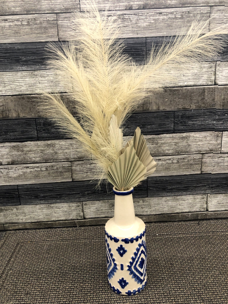 FAUX FERN IN BLUE/TAN CERAMIC VASE.