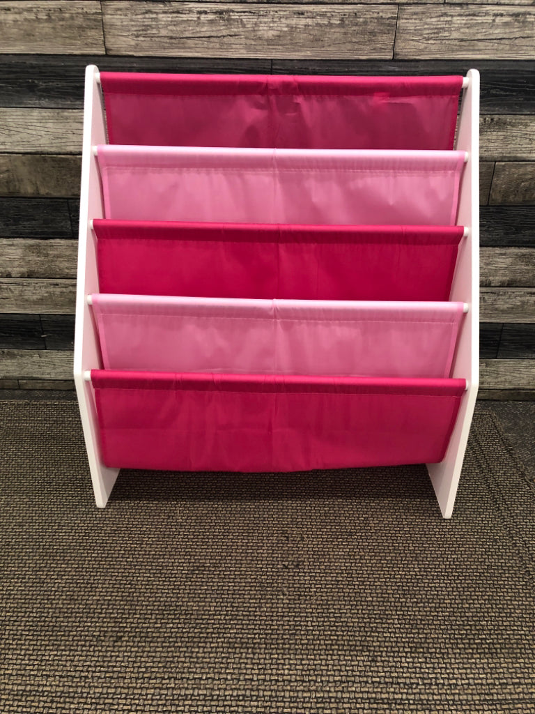 CHILDRENS PINK SLING BOOK RACK.