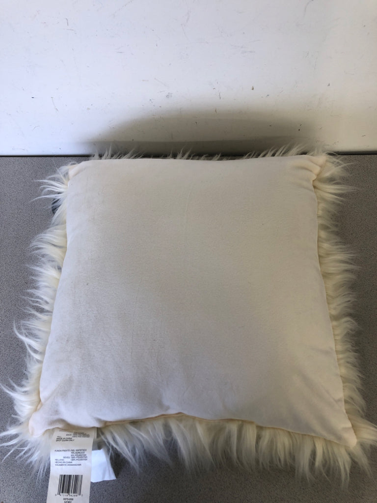 SQUARE WHITE FRINGE PILLOW.