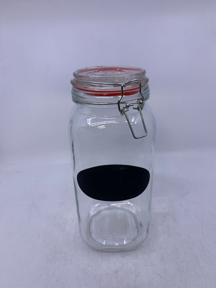 LARGE GLASS CANISTER WITH CHALK LABEL.