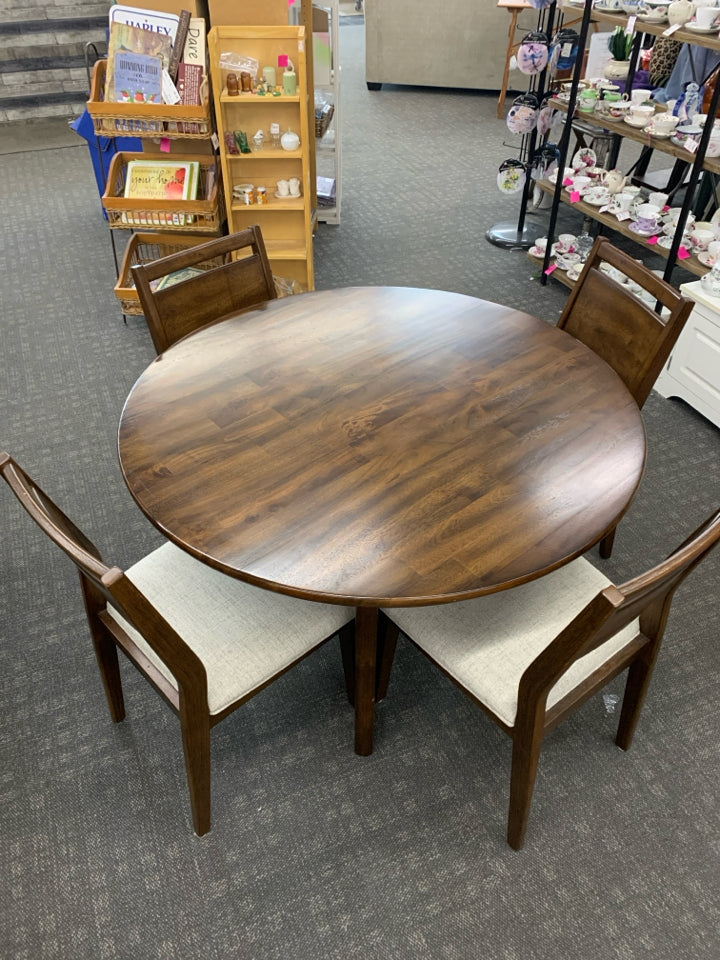 ROUND DK WOOD DINING TABLE W/4 GREY SEAT CHAIRS.