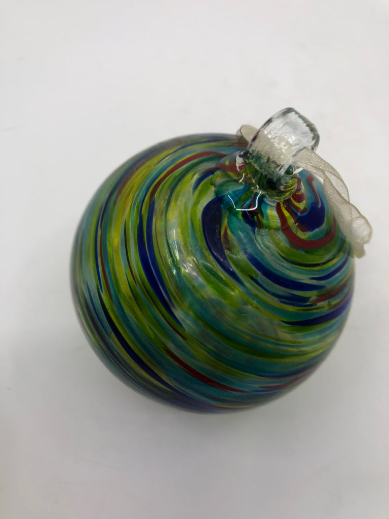 TINTED COLORFUL BLOWN GLASS ORNAMENT.