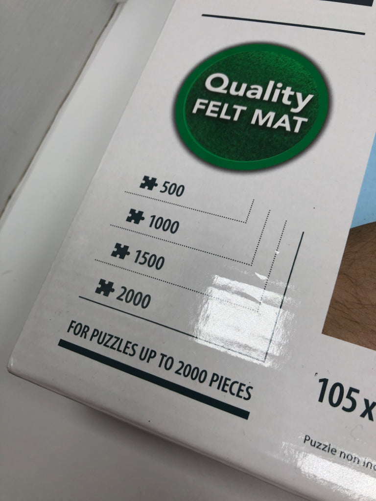NIB PUZZLE MAT.