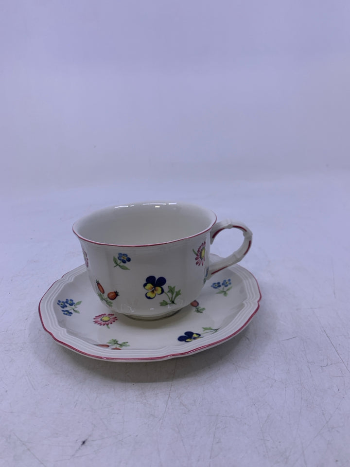 WHITE W/ ASSORTED FLOWERS RED RIM.