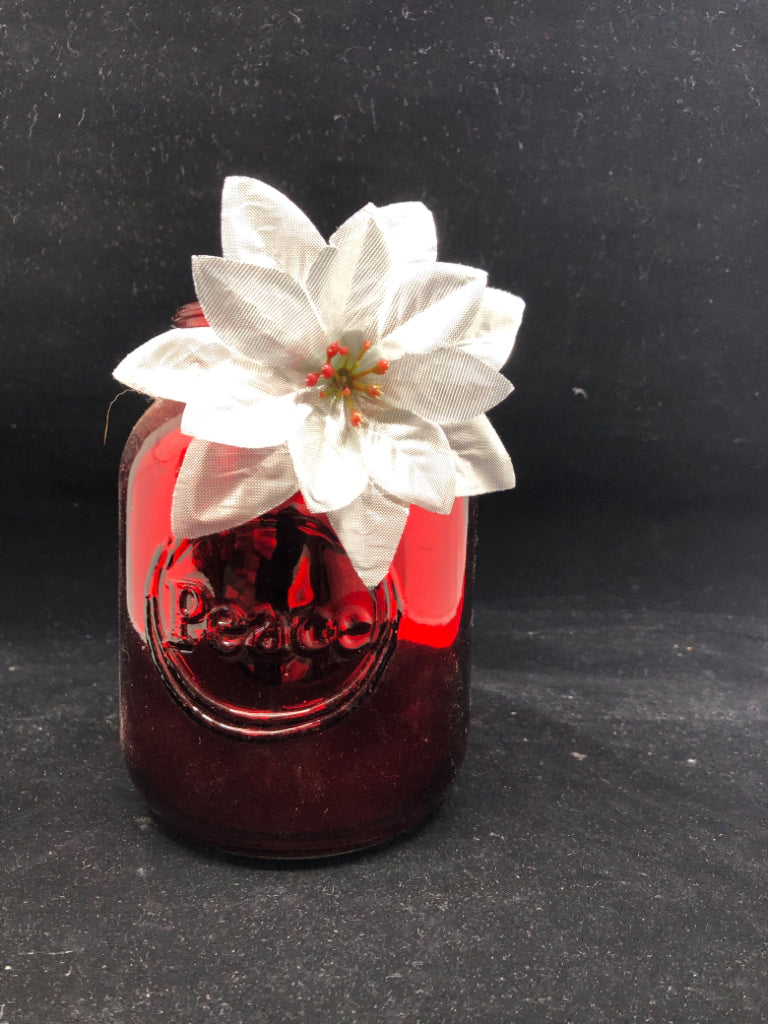 METALLIC RED MASON JAR WITH FLOWER.