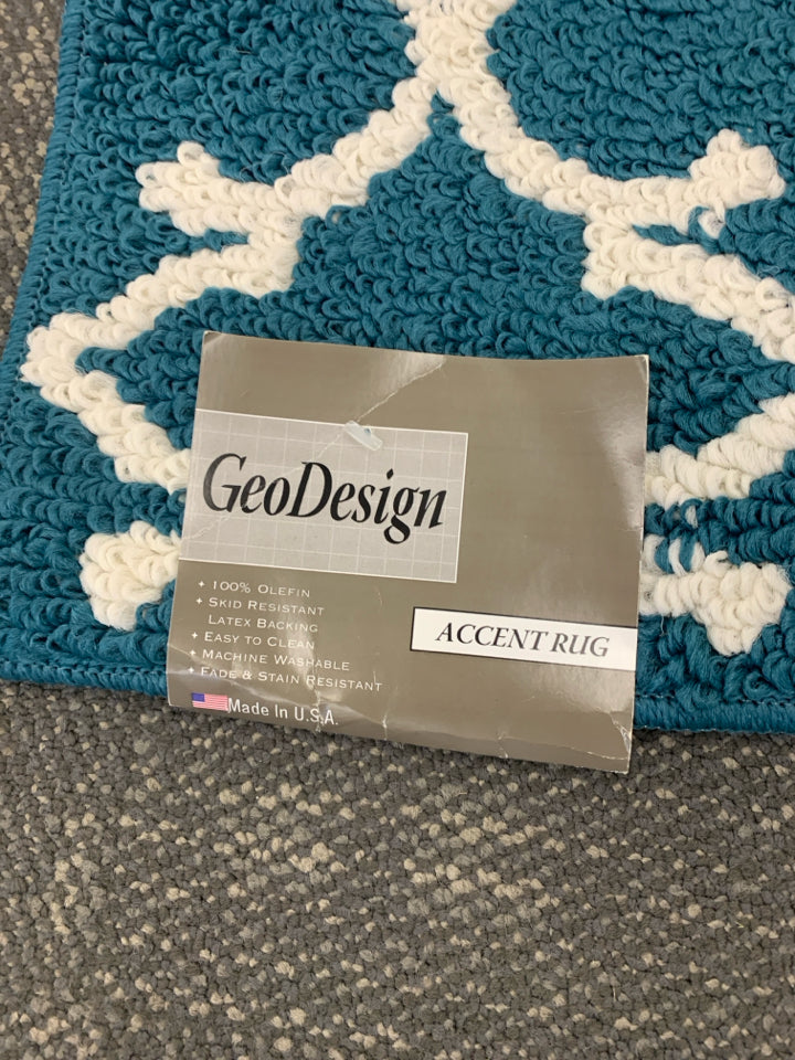 NIP TEAL ACCENT RUG.