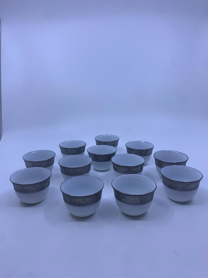 12 SAKE CUPS SILVER TRIM.