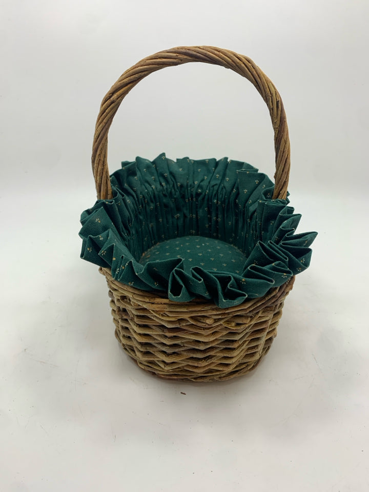 OVAL BASKET W/GREEN FABRIC LINER.