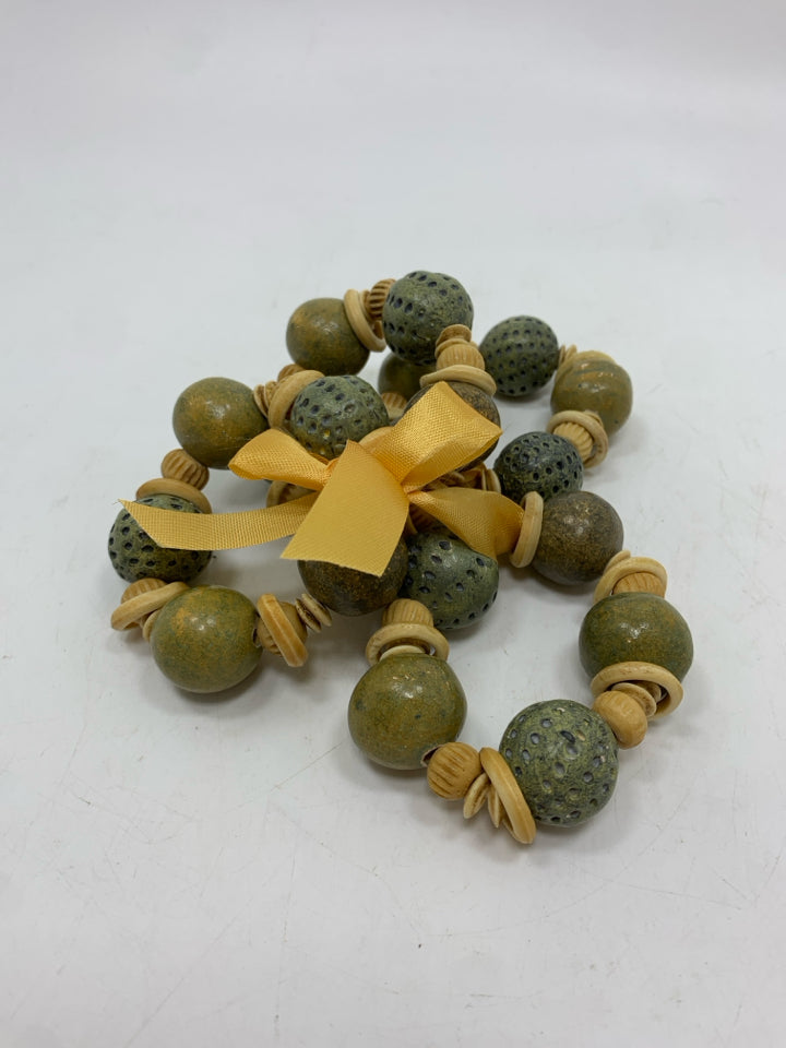 4PK STONE BEAD NAPKIN RINGS.
