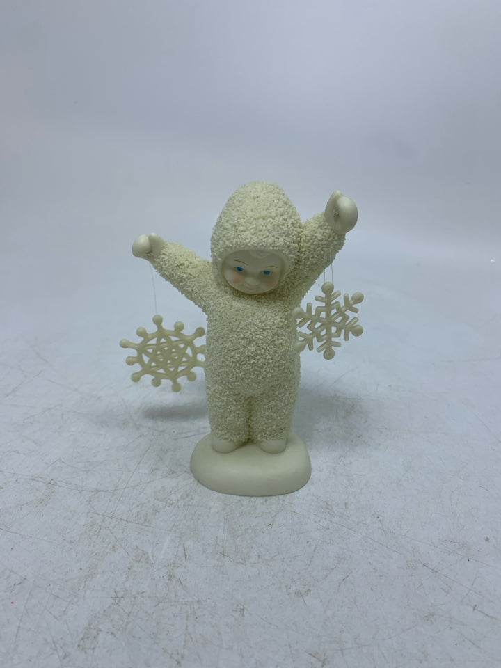 BABY HOLDING SNOWFLAKES SNOWBABIES.