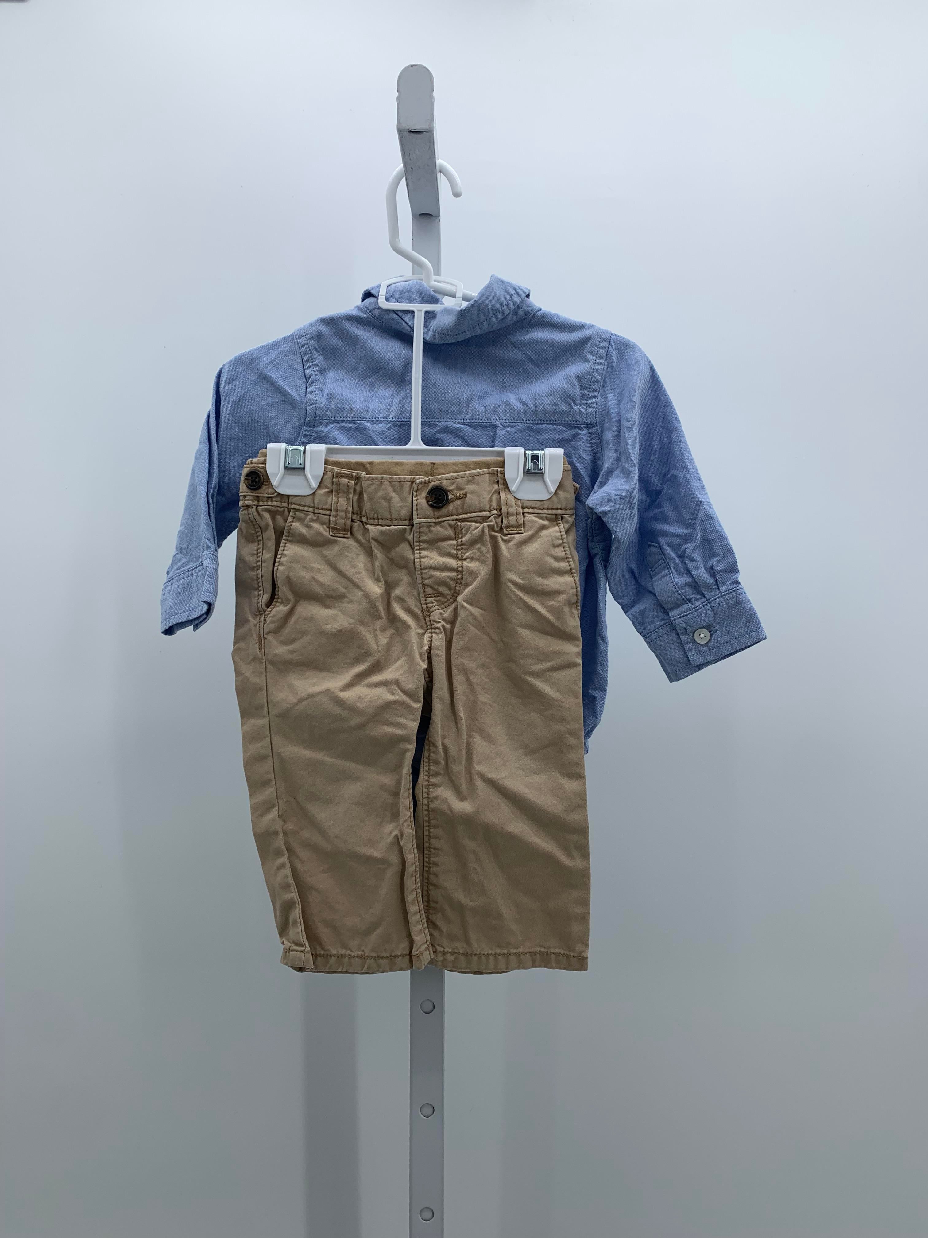 BTN DOWN SHIRT AND TAN PANTS