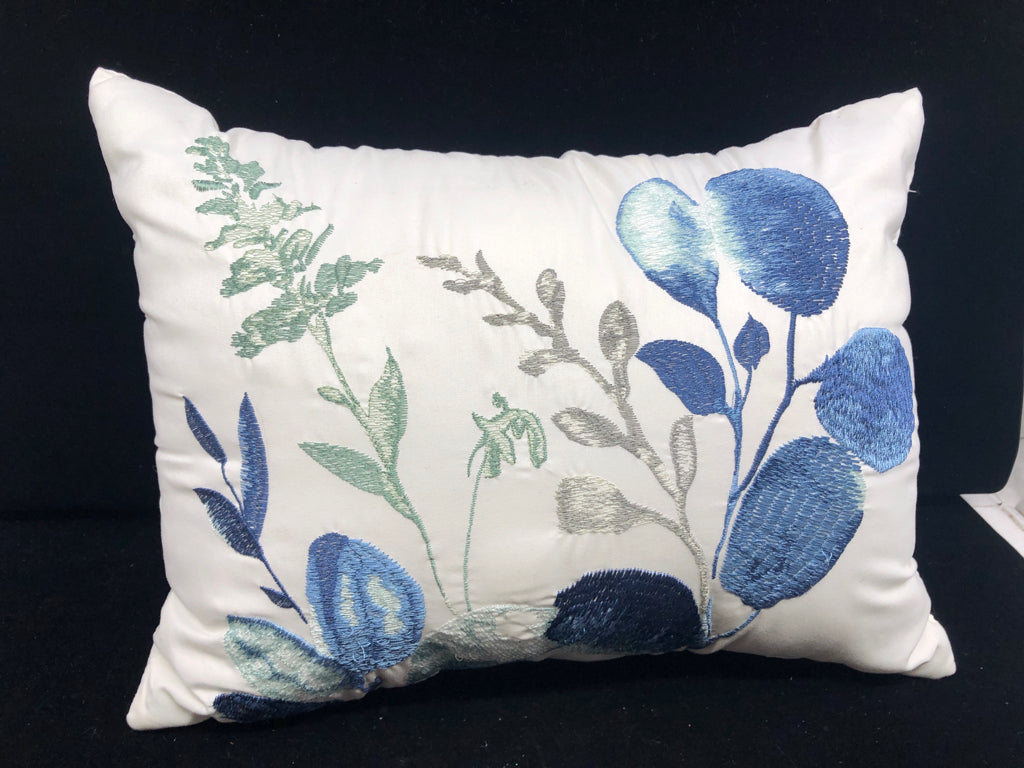 WHITE PILLOW W BLUE EMBROIDERED PLANTS.